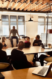 Tourism professionals engaging with AI tools in a workshop